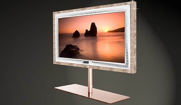 A luxurious tv stand featuring a picture of a sunset, perfect for a wealthy consumer.