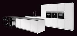 Cook In Style in The Allmilmö az III Kitchen with black counter tops.