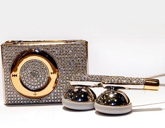 A gold ipod with diamonds and earphones worth an astounding amount of $40.