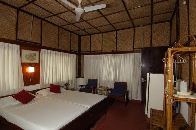 A room with beds at Sands Resort offering stunning views of the best coral reefs.