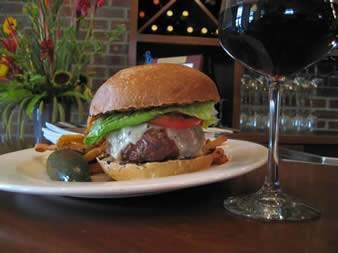 A scruffy North Park spot now offers seriously good food, including burgers and fries accompanied by a glass of wine.