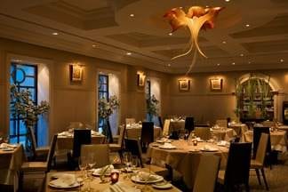 A restaurant in San Francisco is set up with tables and chairs.