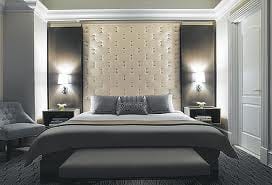 Keywords: bed, room, Carlyle hotel

Modified Description: A comfortable bed in a luxurious room at Carlyle hotel.