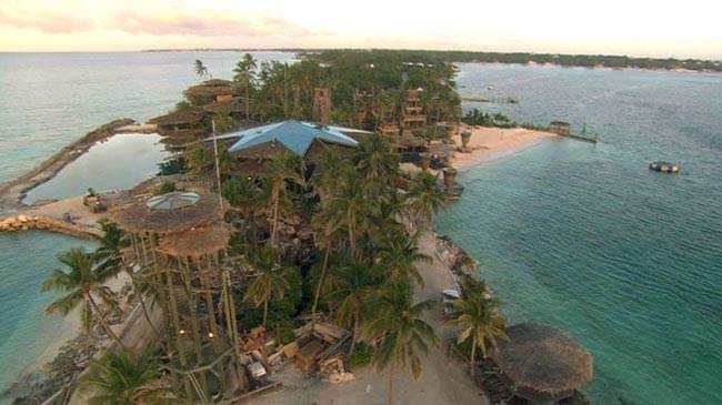 An aerial view of a luxury vacation at Nygard Cay island.