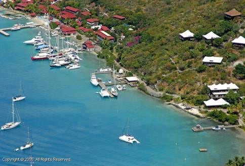 An aerial view of Bitter End Yacht Club, a floating paradise with boats docked in the water.