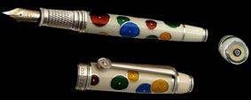 A colorful fountain pen with stylish dots on it.