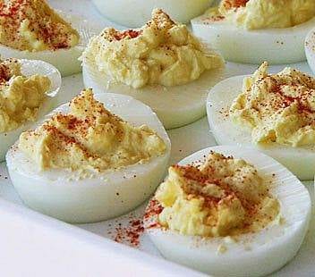 Deviled eggs from the 2010 Hotel and Restaurant Trend List on a white plate.