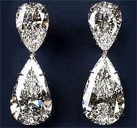 A pair of pear shaped diamond earrings, precious tear drops.