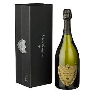 A bottle of 1966 Dom Perignon champagne sold at $1,965 with a box in front of it.