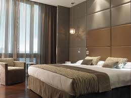Luxurious beds in a room for person on a business or leisure trip.