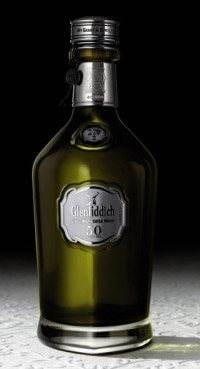 Discover the Most Precious Whisky from Glenfiddich on a table with a black background.