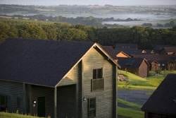 Enjoy the local pleasure in a group of houses on a hillside overlooking a valley at Bluestone Resort.