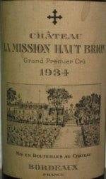 A bottle of wine with a label on it, showcasing Mission Haut-Brion.