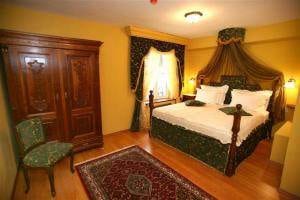 A bed or beds in a room at St. Martin's hotel in Trogir, Croatia.