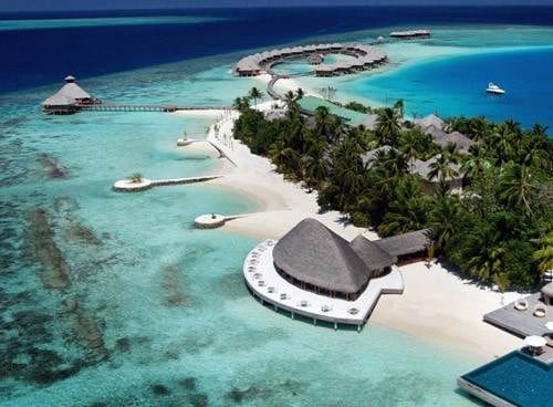An extravagant aerial view of Huvafen Fushi, an island in the Maldives.
