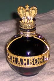 Chambord Liqueur Royale De France, a black bottle with a gold crown, known for its rarity and luxury.