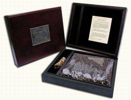 A wooden box with a refreshing piece of paper inside.