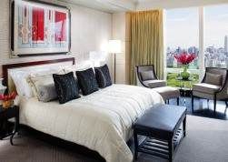 A city view bedroom for a girlfriend getaway.