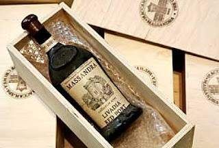 A bottle of Massandra Sherry de la Frontera 1775 in a wooden box.