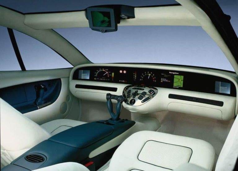 The luxurious interior of a new Mercedes-Benz SCL 600, featuring a joystick to drive.