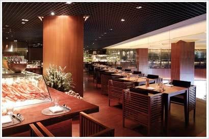 Mezza9: A restaurant with a lot of food on display.