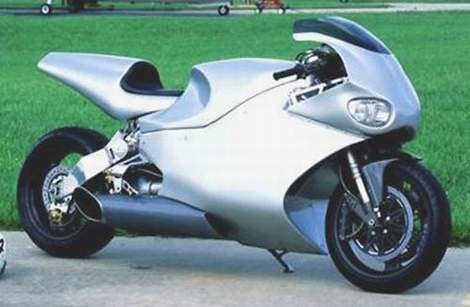 A silver Superbike parked on the side of the road.