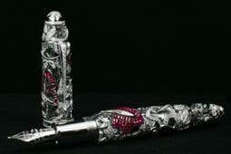 A limited edition silver and red fountain pen for creating a stylish signature.