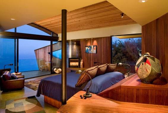 Have a romantic getaway at Post Ranch Inn, a bedroom with a view of the ocean.