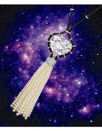 A necklace with a tassel and pearls, guaranteed indulgence with diamond and seed pearl pendant.