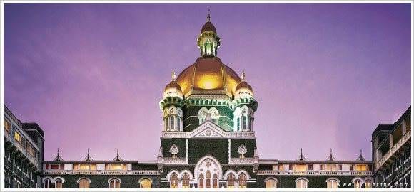 An ornate building with a clock tower: The Crowning Glory.