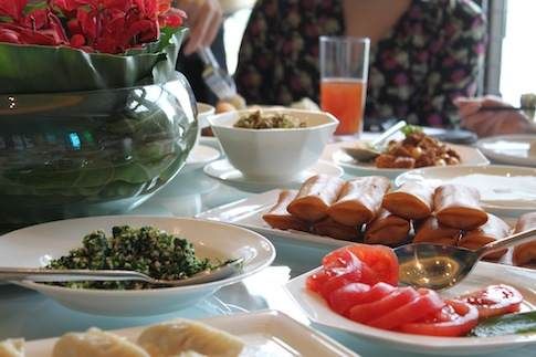 Whampoa Club in Bund to offer a table with a lot of food on it.