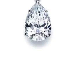 A pear shaped diamond pendant on a white background, symbolizing a woman's best friend.