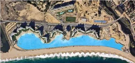 An aerial view of the San Alfonso Del Mar Resort swimming pool near the ocean in Chile.