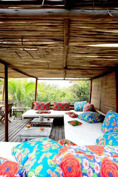 A colorful wooden deck showcasing luxury accommodations in Bahia, Brazil.