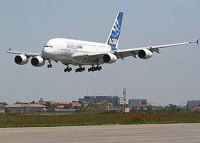 A historic maiden commercial flight of the A380 takes off.