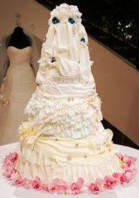 A lavish wedding cake adorned with extravagant decorations.