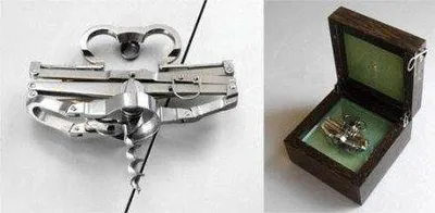 A picture of a platinum metal box with a heart in it.