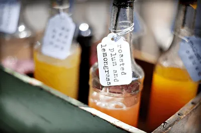 A crate filled with Botanical Cordials and Syrups.