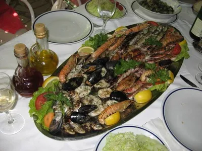 A platter of seafood on a table in Trogir, Croatia.