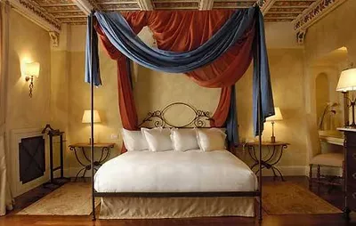 Sleep peacefully in a luxurious hotel room surrounded by beautiful vineyards at Kempinski Giardino di Constanza.