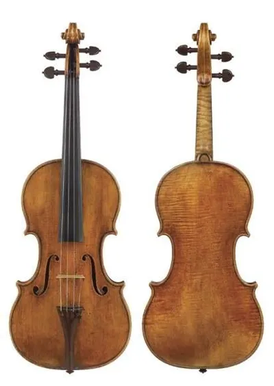 Lady Tennant Stradivarius violin with a bow, played alongside another violin.