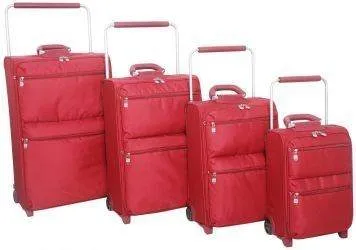 Four lightweight red suitcases on a white background.