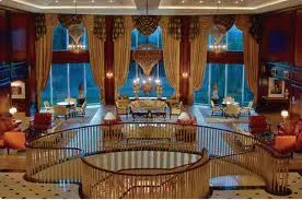 A room with a large window and a staircase that makes your trip awesome!