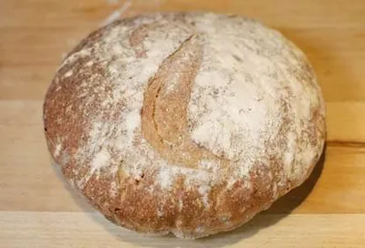 A Shepherd Loaf sitting on a wooden table, appealing to high-profile customers.