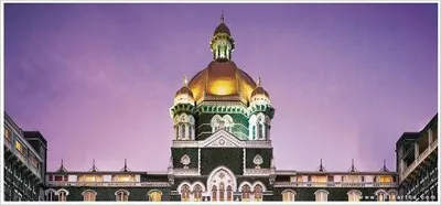 An ornate building with a clock tower: The Crowning Glory.