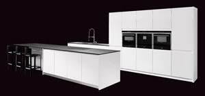 Cook In Style in The Allmilmö az III Kitchen with black counter tops.