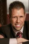 A Man in a Suit and Tie featured in the Just released:2010 Hotel and Restaurant Trend List.