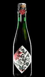 A bottle of black beer with a Carlsberg Jacobsen Vintage No1 design.