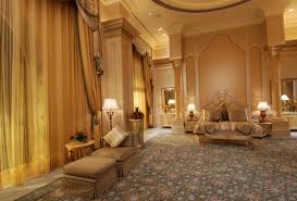 An ornate bedroom with an ornate ceiling in the "Palace within palace" – Palace Suite at Emirates Palace, Abu Dhabi.