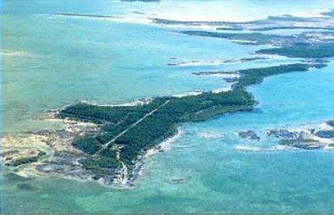 An aerial view of an island in the ocean.